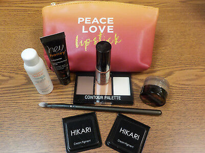 Ipsy Bag with 7 Beauty Products and a Eye Brush